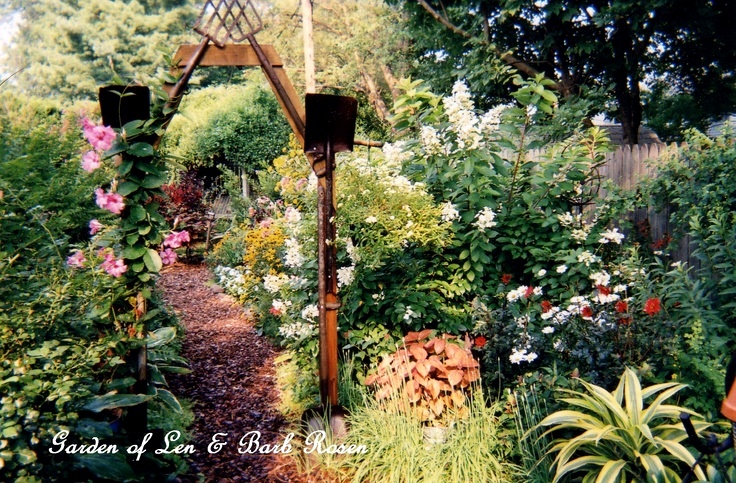 Rusty Tool Arbor http://ourfairfieldhomeandgarden.com/a-trip-down-memory-lane-my-former-garden/