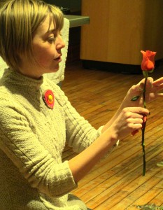 Emily removes the first few outer petals on each rose to freshen them up.