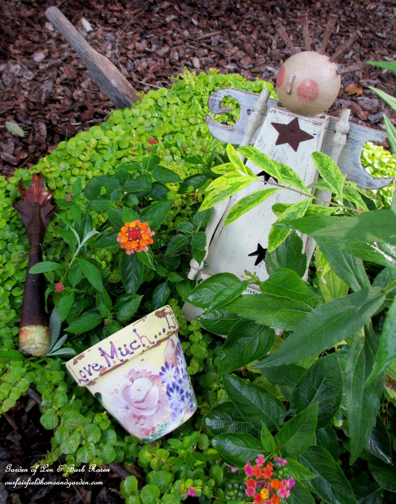 Garden Angel in a planted wheelbarrow. https://ourfairfieldhomeandgarden.com/fall-is-in-the-air/
